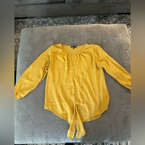 Yellow blouse with white pattern